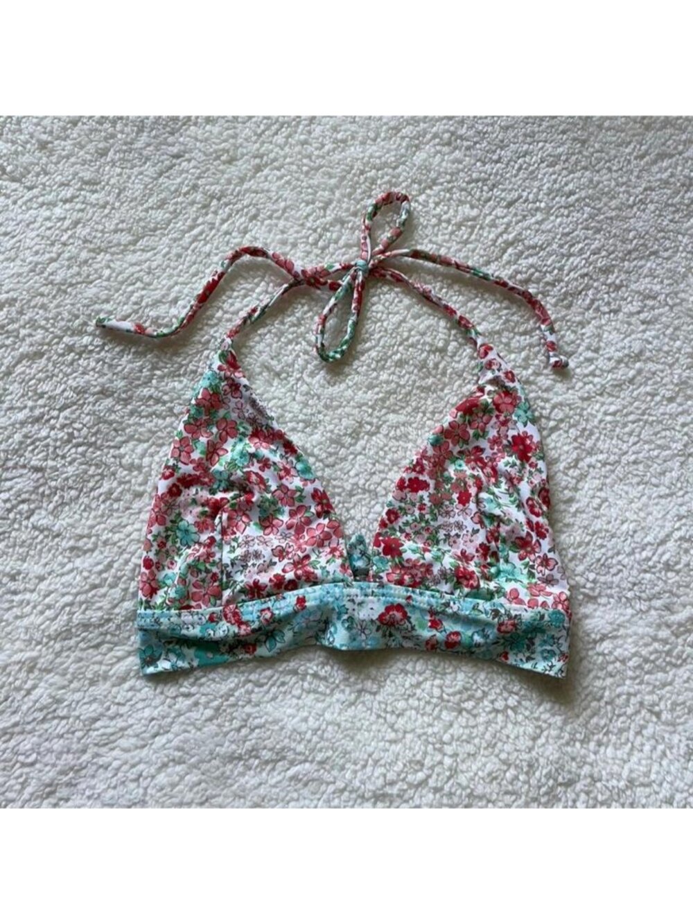 Floral bikini top with adjustable straps and tie back